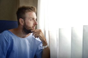 man in a hospital room
